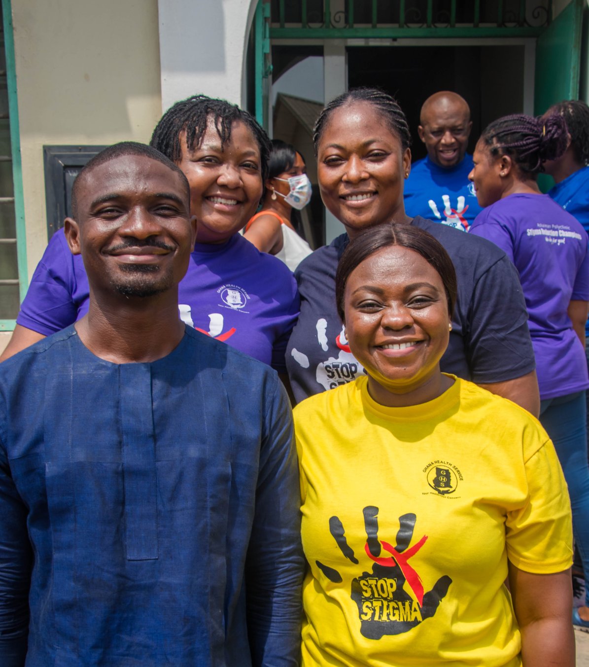 Group of health workers posing with t-shirt